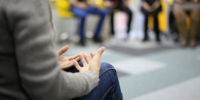 patients listening to their therapist speak about when is residential treatment necessary