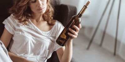 A woman suffering from the dangers of mixing alcohol and klonopin.