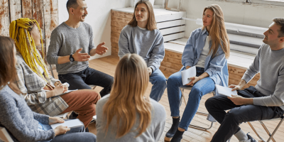 patients in group at alcohol detox near atlanta talking about addiction treatment aftercare