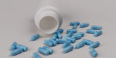 spilled pills from someone addicted to prescription drugs