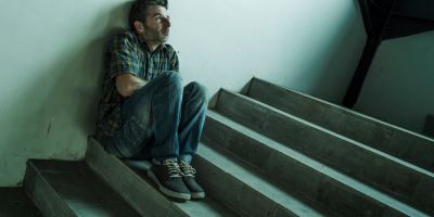 man experiences negative effects of hallucinogens like paranoia