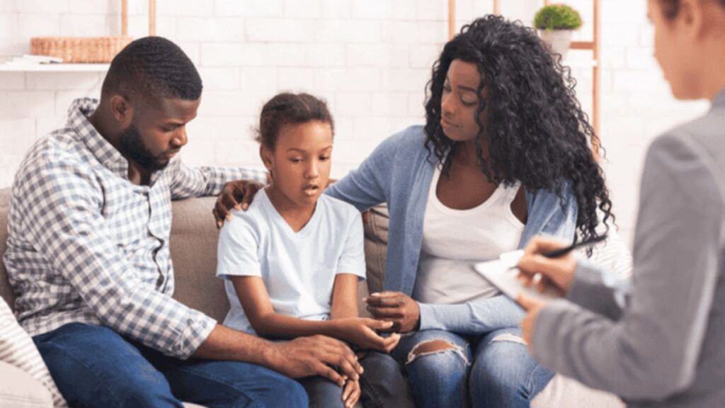Therapist conducting a systematic family therapy during family counseling in Georgia.